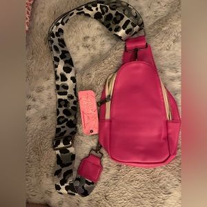 Hot/ Barbie pink sling/crossbody bag with leopard strap.